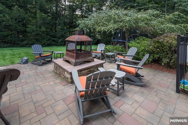 87 Skytop Dr, Mahwah, NJ 07430 - view of patio / terrace featuring a trampoline and an outdoor fire pit