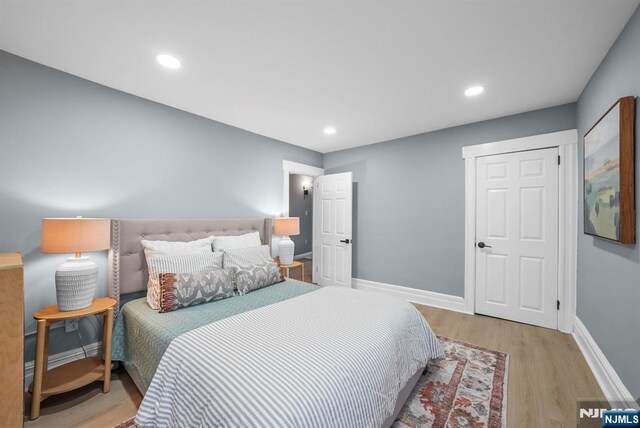 518 Bloomfield Ave, Nutley, NJ 07110 - bedroom featuring baseboards, wood finished floors, and recessed lighting