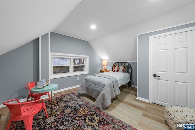 518 Bloomfield Ave, Nutley, NJ 07110 - bedroom with wood finished floors, baseboards, and vaulted ceiling