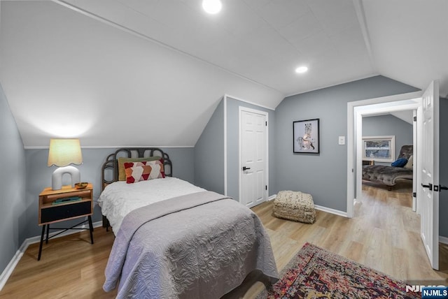 518 Bloomfield Ave, Nutley, NJ 07110 - bedroom featuring vaulted ceiling, light wood-style flooring, and baseboards