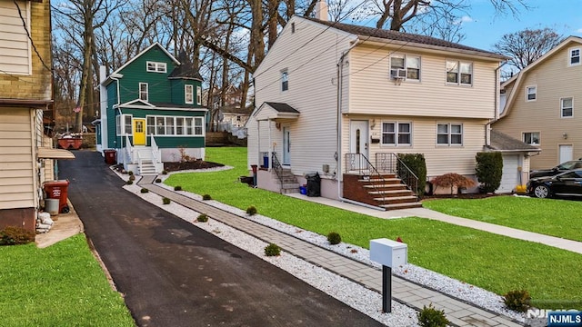 518 Bloomfield Ave, Nutley, NJ 07110 - view of front of property featuring a front lawn and driveway
