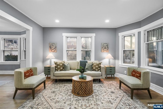518 Bloomfield Ave, Nutley, NJ 07110 - living room with healthy amount of natural light, baseboards, wood finished floors, crown molding, and recessed lighting