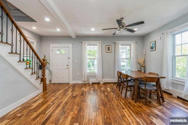 129 Phelps Ave, Englewood, NJ 07631 - entryway with wood finished floors, stairs, baseboards, recessed lighting, and beamed ceiling