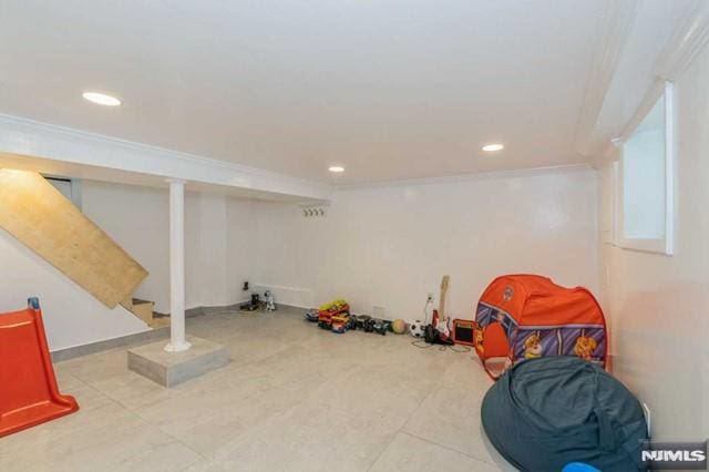 129 Phelps Ave, Englewood, NJ 07631 - basement with ornamental molding, stairway, recessed lighting, and tile patterned flooring
