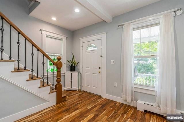 129 Phelps Ave, Englewood, NJ 07631 - entrance foyer with wood finished floors, beam ceiling, stairs, baseboards, and recessed lighting