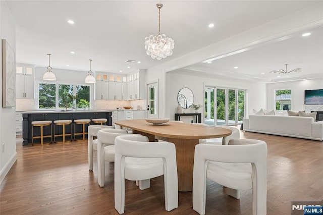 107 Rutland Rd, Glen Rock, NJ 07452 - dining room with a chandelier, recessed lighting, and wood finished floors