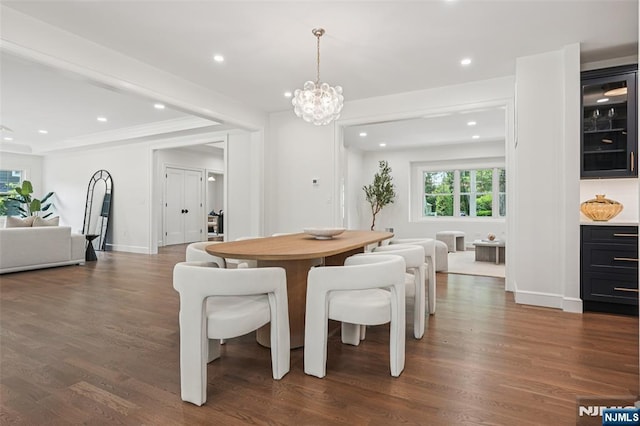 107 Rutland Rd, Glen Rock, NJ 07452 - dining space with dark wood-type flooring, recessed lighting, a chandelier, and baseboards