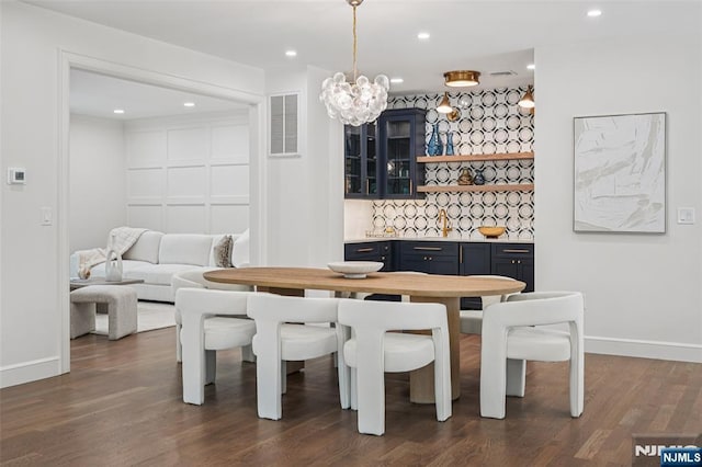 107 Rutland Rd, Glen Rock, NJ 07452 - dining room featuring baseboards, a chandelier, dark wood-style floors, and recessed lighting