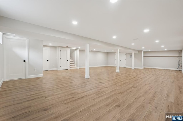 107 Rutland Rd, Glen Rock, NJ 07452 - finished below grade area featuring light wood-style floors, stairway, baseboards, and recessed lighting