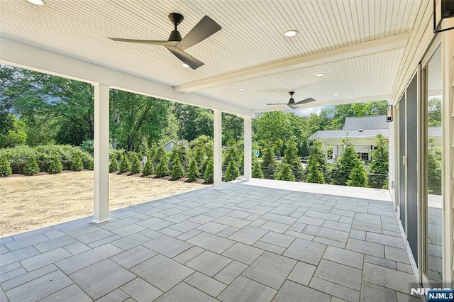 107 Rutland Rd, Glen Rock, NJ 07452 - view of patio / terrace featuring a ceiling fan and view of wooded area