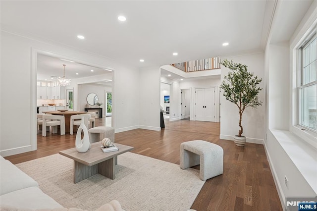 107 Rutland Rd, Glen Rock, NJ 07452 - living room featuring crown molding, wood finished floors, a chandelier, recessed lighting, and baseboards