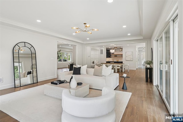 107 Rutland Rd, Glen Rock, NJ 07452 - living room featuring a chandelier, wood finished floors, baseboards, recessed lighting, and crown molding