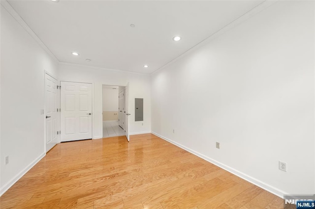 3326 Riverview Ave Unit 326, Englewood, NJ 07631 - spare room with electric panel, crown molding, baseboards, recessed lighting, and light wood-style floors