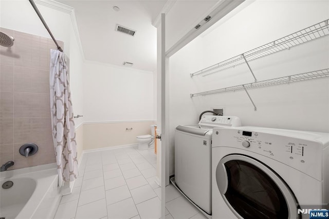3326 Riverview Ave Unit 326, Englewood, NJ 07631 - laundry area featuring washer and dryer, light tile patterned floors, and baseboards