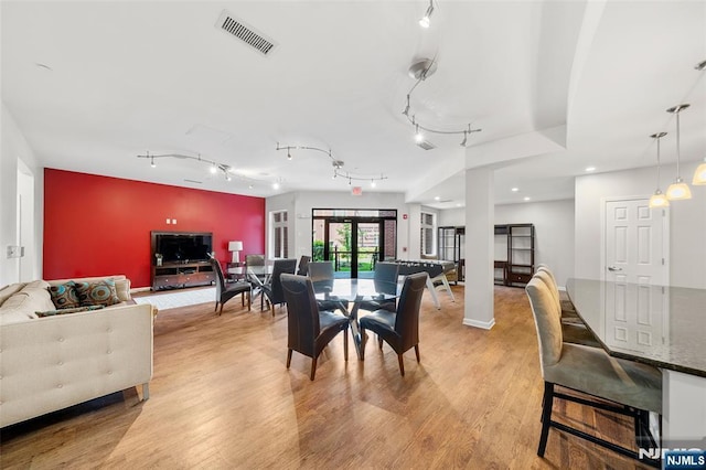 3326 Riverview Ave Unit 326, Englewood, NJ 07631 - dining room featuring light wood-style flooring and track lighting