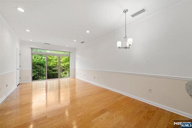 3326 Riverview Ave Unit 326, Englewood, NJ 07631 - unfurnished room featuring baseboards, ornamental molding, light wood finished floors, recessed lighting, and a chandelier