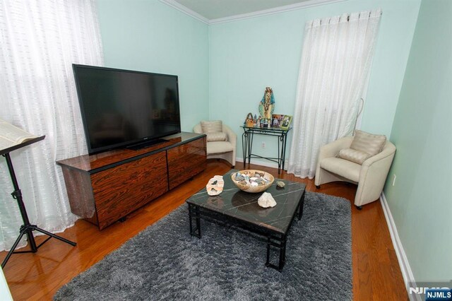 332 Summer St, Clifton, NJ 07011 - living room featuring crown molding and wood finished floors