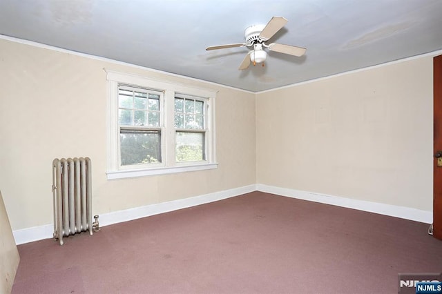 267 Hoover Ave, Bloomfield, NJ 07003 - unfurnished room with radiator heating unit, dark carpet, ceiling fan, baseboards, and ornamental molding
