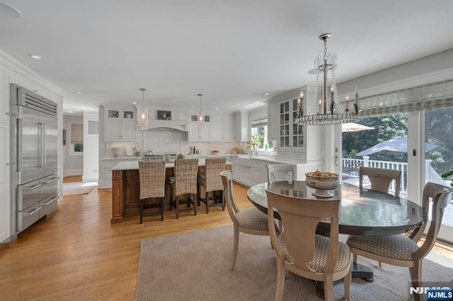 43 Heights Rd, Allendale, NJ 07401 - dining area with light wood-style flooring, a chandelier, and recessed lighting