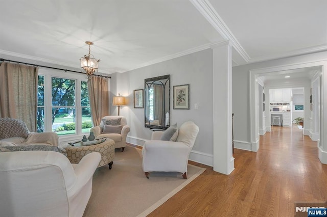 43 Heights Rd, Allendale, NJ 07401 - living area featuring ornamental molding, wood finished floors, and a chandelier