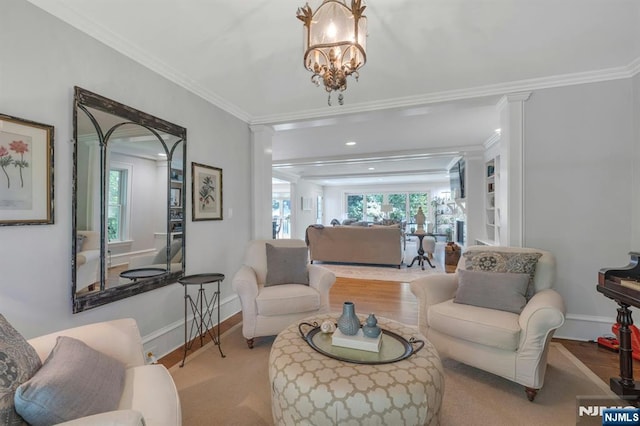 43 Heights Rd, Allendale, NJ 07401 - living room featuring ornamental molding, plenty of natural light, and a chandelier