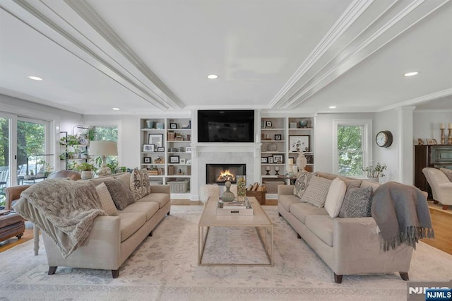 43 Heights Rd, Allendale, NJ 07401 - living room with crown molding, plenty of natural light, a lit fireplace, recessed lighting, and wood finished floors