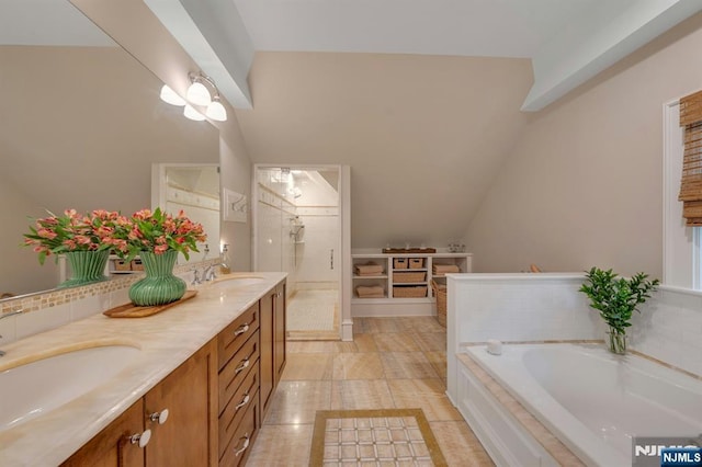 43 Heights Rd, Allendale, NJ 07401 - bathroom with double vanity, a garden tub, a tile shower, and lofted ceiling