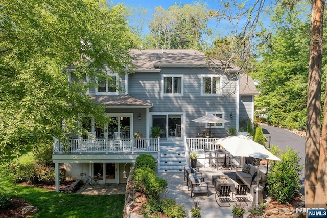 43 Heights Rd, Allendale, NJ 07401 - back of house with a patio, a wooden deck, roof with shingles, and stairway