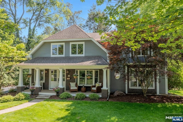 43 Heights Rd, Allendale, NJ 07401 - view of front facade featuring roof with shingles, outdoor lounge area, a front lawn, and covered porch