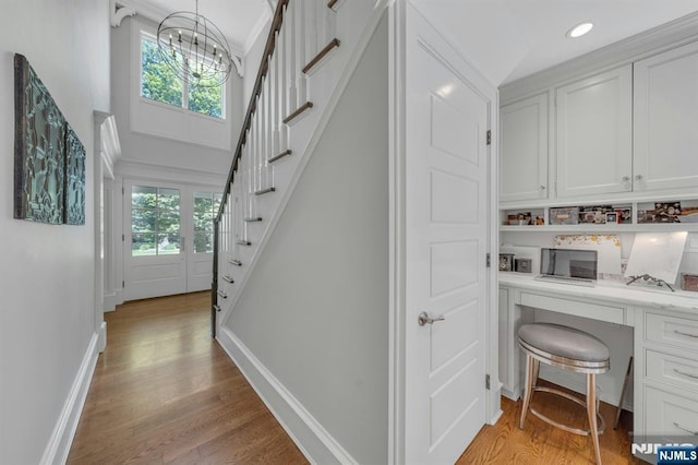 43 Heights Rd, Allendale, NJ 07401 - hall featuring stairway, light wood finished floors, a chandelier, an office area, and recessed lighting