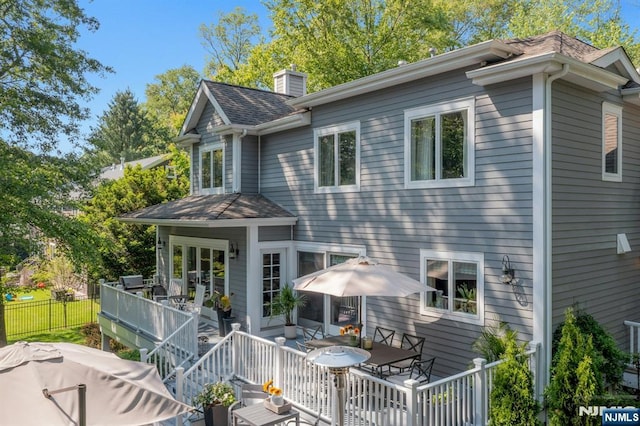43 Heights Rd, Allendale, NJ 07401 - back of house featuring outdoor dining space, a chimney, a wooden deck, and roof with shingles