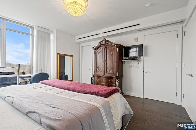 320 Adolphus Ave Unit 702, Cliffside Park, NJ 07010 - bedroom featuring dark wood finished floors and a wall of windows