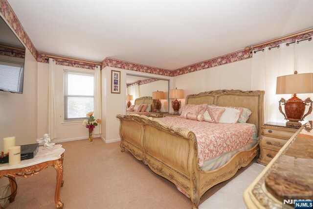 8841 Kennedy Unit 19, North Bergen, NJ 07047 - bedroom featuring light colored carpet and baseboards