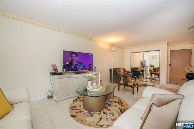 8841 Kennedy Unit 19, North Bergen, NJ 07047 - living room with light tile patterned floors and baseboards