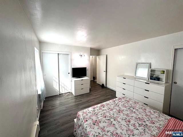 476 Joralemon St Unit F3, Belleville, NJ 07109 - bedroom featuring dark wood-style floors, baseboards, and a baseboard radiator