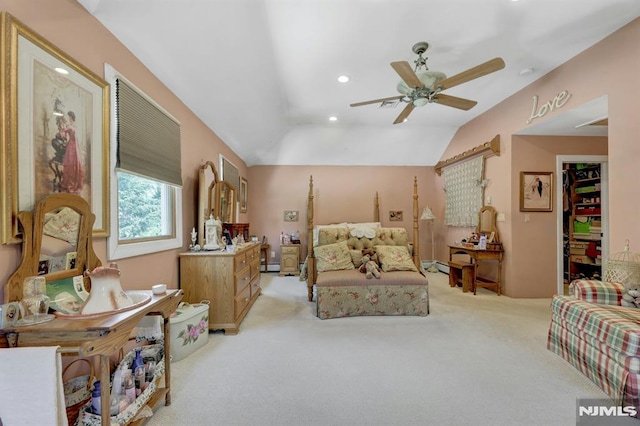 57 Eckerson Ave, Closter, NJ 07624 - bedroom with light carpet, a spacious closet, vaulted ceiling, a baseboard heating unit, and recessed lighting