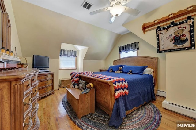 57 Eckerson Ave, Closter, NJ 07624 - bedroom with a baseboard heating unit, light wood-style flooring, lofted ceiling, and ceiling fan