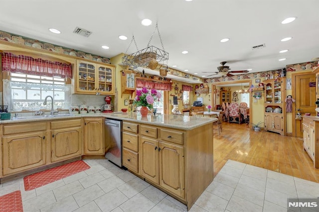 57 Eckerson Ave, Closter, NJ 07624 - kitchen featuring a sink, dishwasher, a peninsula, light countertops, and a ceiling fan