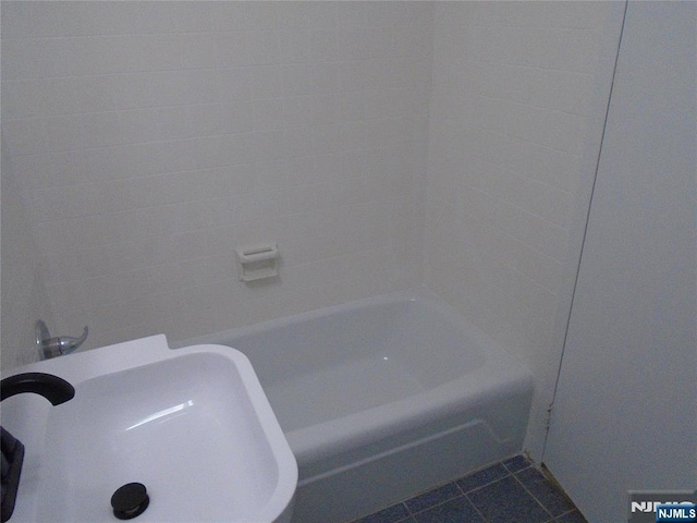 1 Wall St Unit 8-C, Fort Lee, NJ 07024 - bathroom featuring tile patterned flooring and shower / bath combination