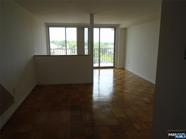 1 Wall St Unit 8-C, Fort Lee, NJ 07024 - spare room with baseboards