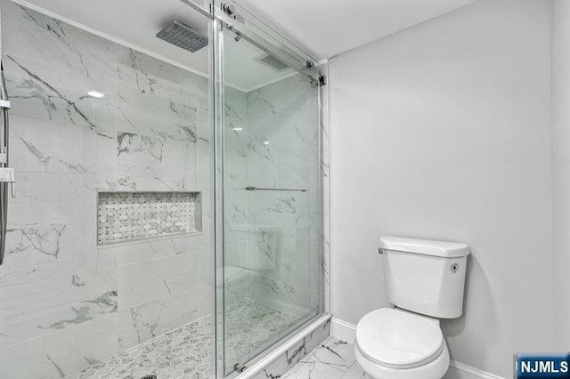 310 Spring Valley Rd, Paramus, NJ 07652 - bathroom with baseboards, marble finish floors, toilet, and a marble finish shower