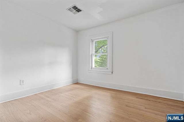 310 Spring Valley Rd, Paramus, NJ 07652 - spare room with wood finished floors and baseboards