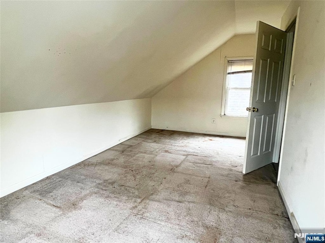 22 Clark St, Glen Ridge, NJ 07028 - additional living space with vaulted ceiling and carpet floors