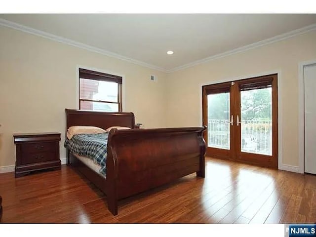 1128 43rd St Unit 1, North Bergen, NJ 07047 - bedroom featuring french doors, access to exterior, wood finished floors, ornamental molding, and baseboards