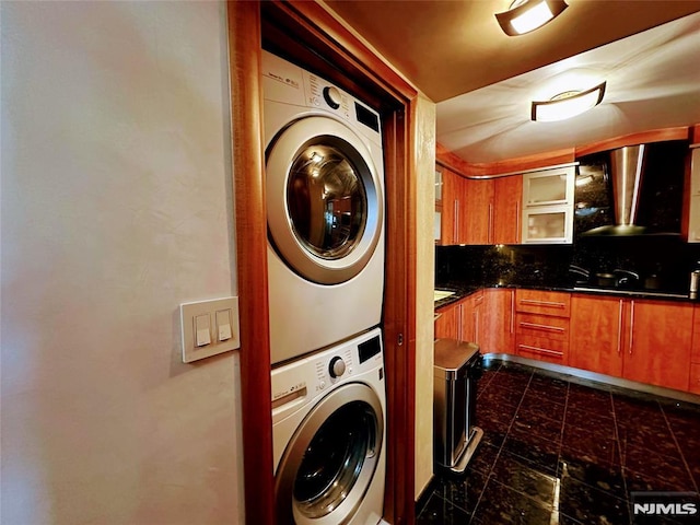 1512 Palisade Ave Unit 17A, Fort Lee, NJ 07024 - laundry room with stacked washer / dryer