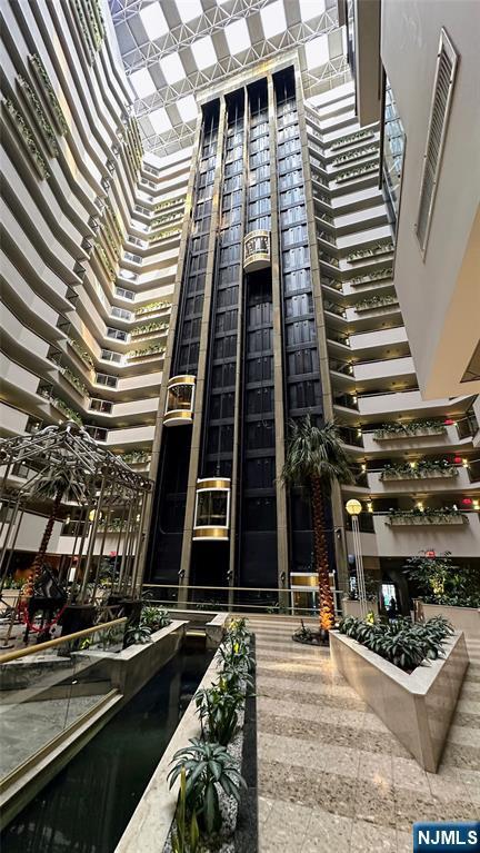 1512 Palisade Ave Unit 17A, Fort Lee, NJ 07024 - view of building exterior featuring stairway