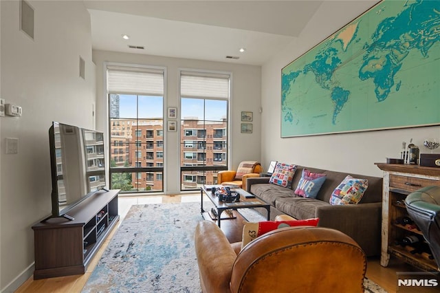 24 Ave At Port Imperial Unit 416, West New York, NJ 07093 - living room with wood finished floors, recessed lighting, and baseboards