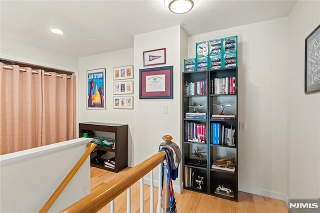 24 Ave At Port Imperial Unit 416, West New York, NJ 07093 - hallway with an upstairs landing, wood finished floors, baseboards, and recessed lighting