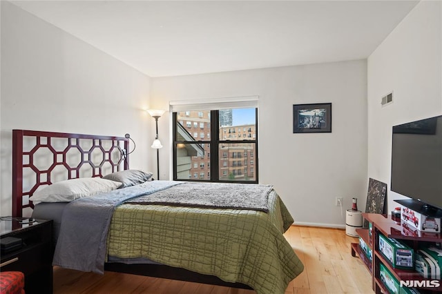 24 Ave At Port Imperial Unit 416, West New York, NJ 07093 - bedroom with wood finished floors and baseboards