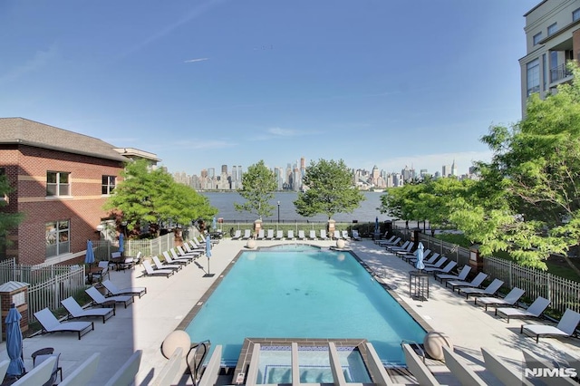 24 Ave At Port Imperial Unit 416, West New York, NJ 07093 - community pool featuring a skyline view and a patio